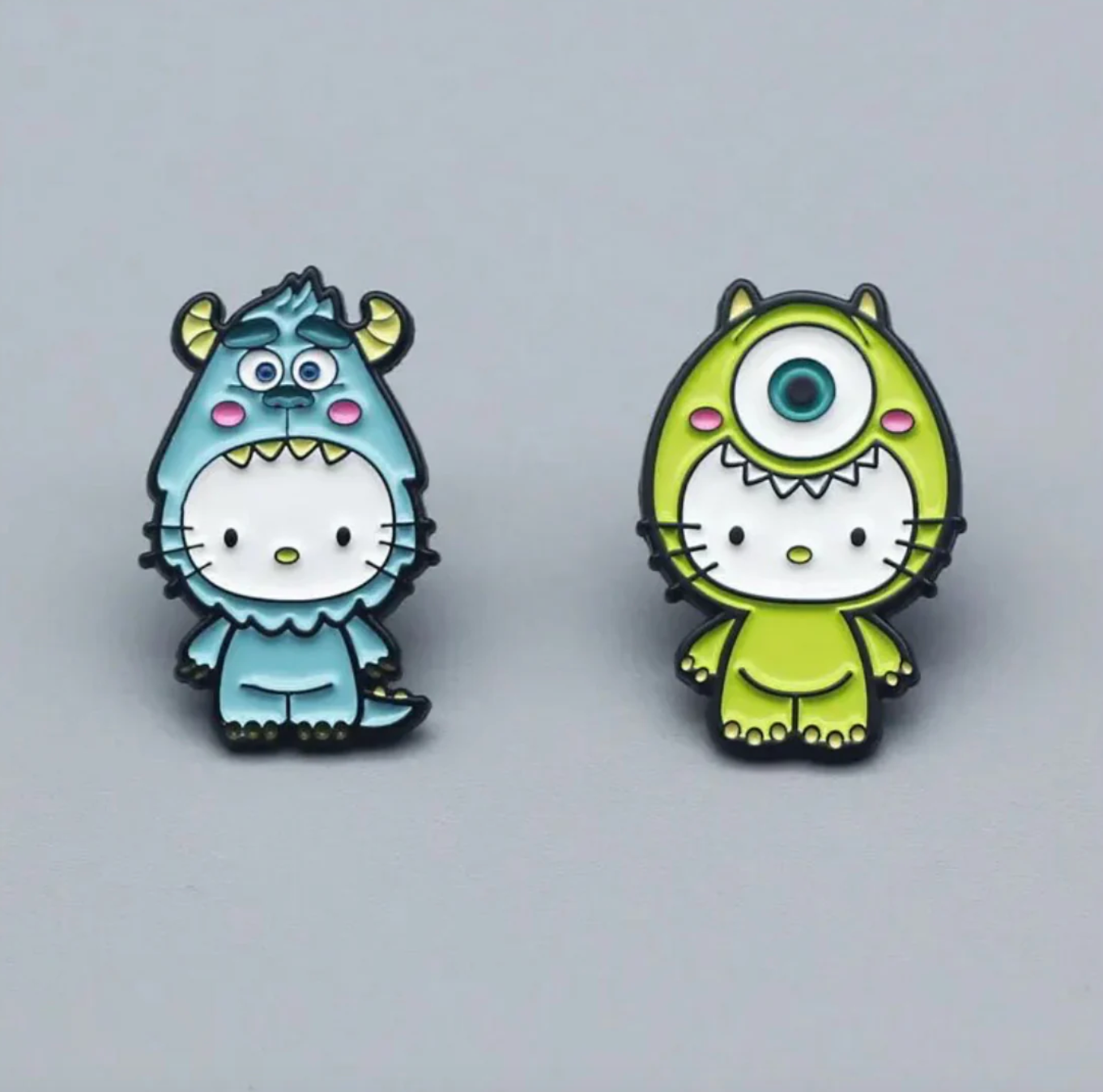 π Hello Kitty Monster Inc Enamel Pin Set β 2pcs Cute & Spooky Collectible Pins