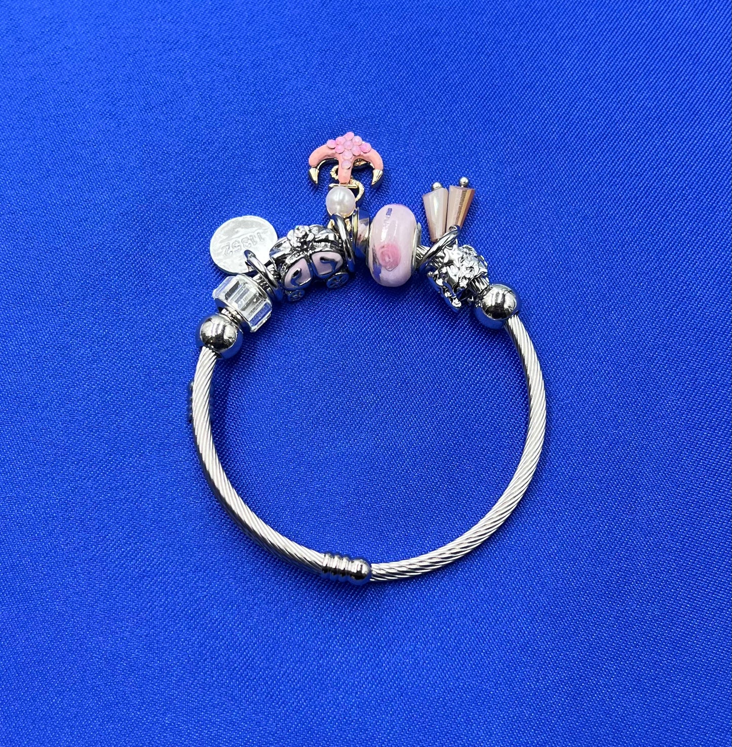 Silver Bangle Bracelet with Pink Charms and Anchor