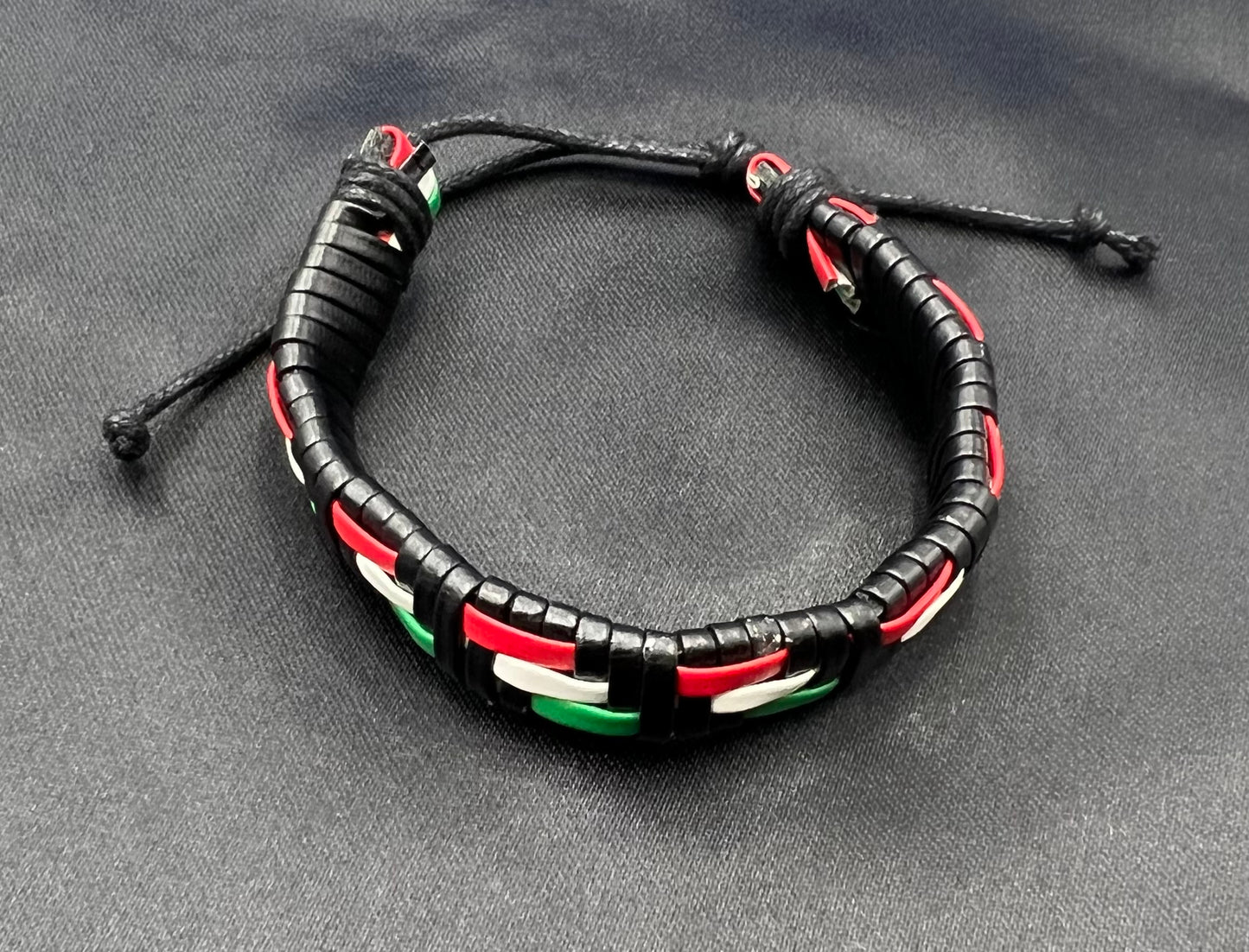 Black Geometric Leather Bracelet β Occident Style with Green, White & Red Accents